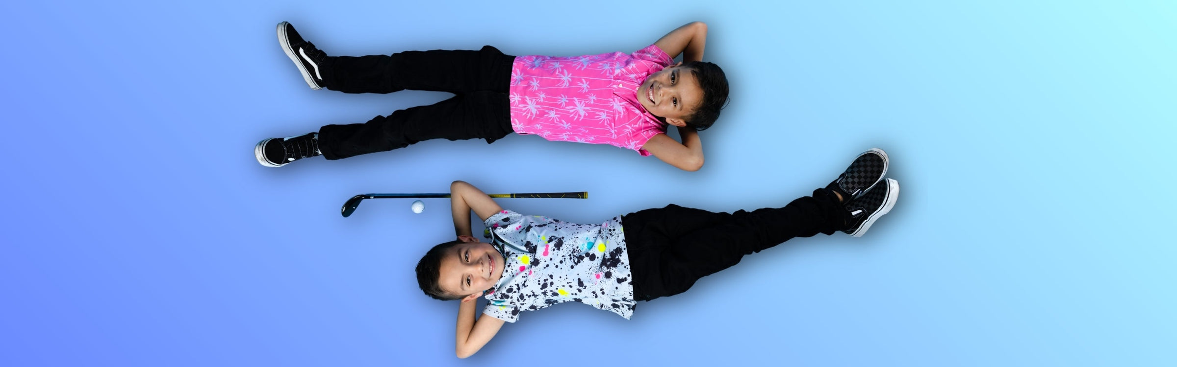 Young boy wearing Sunday Swagger golf polo