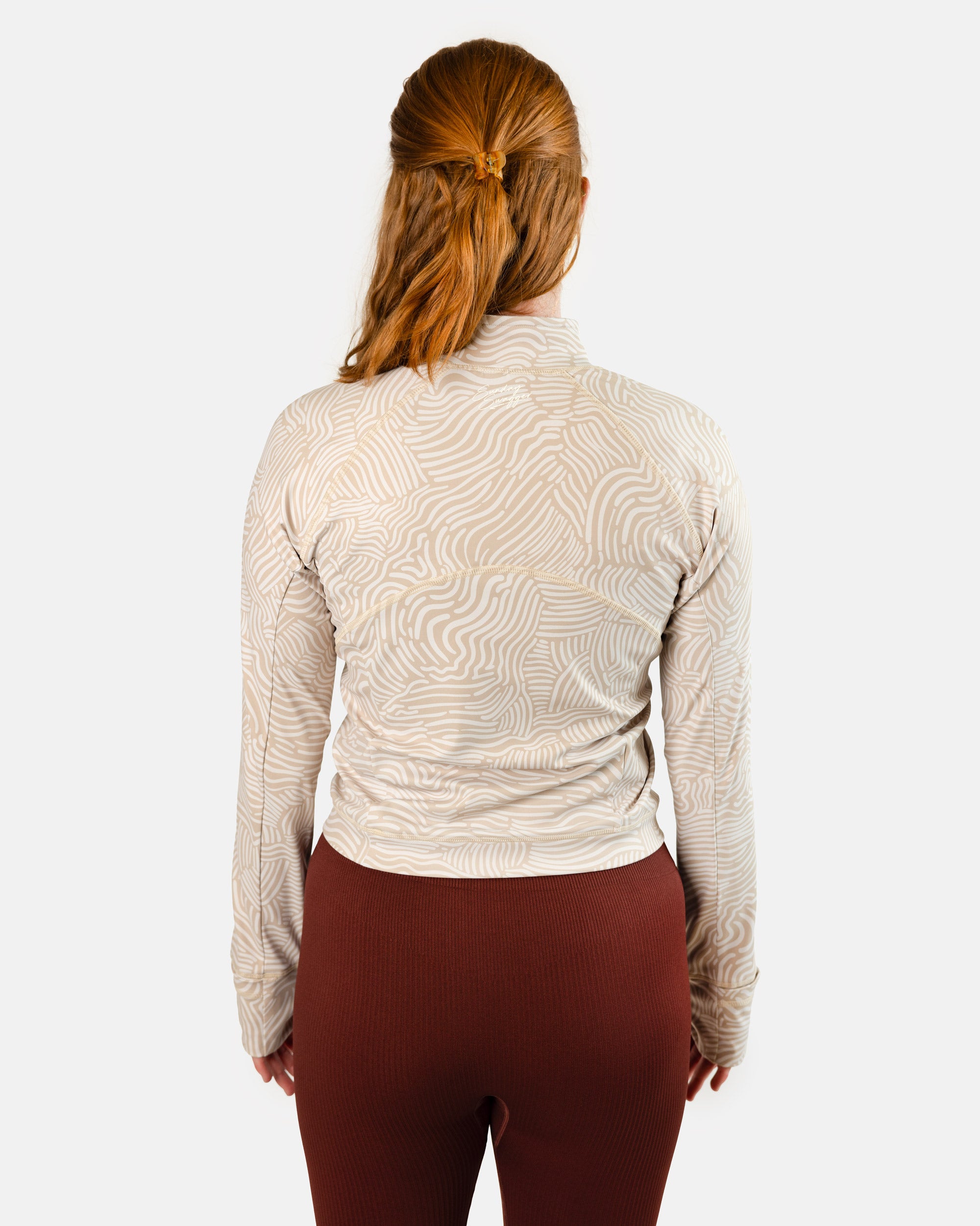 Latte cream women's cropped golf Qzip | Sunday Swagger