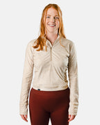 Latte cream women's cropped golf Qzip | Sunday Swagger