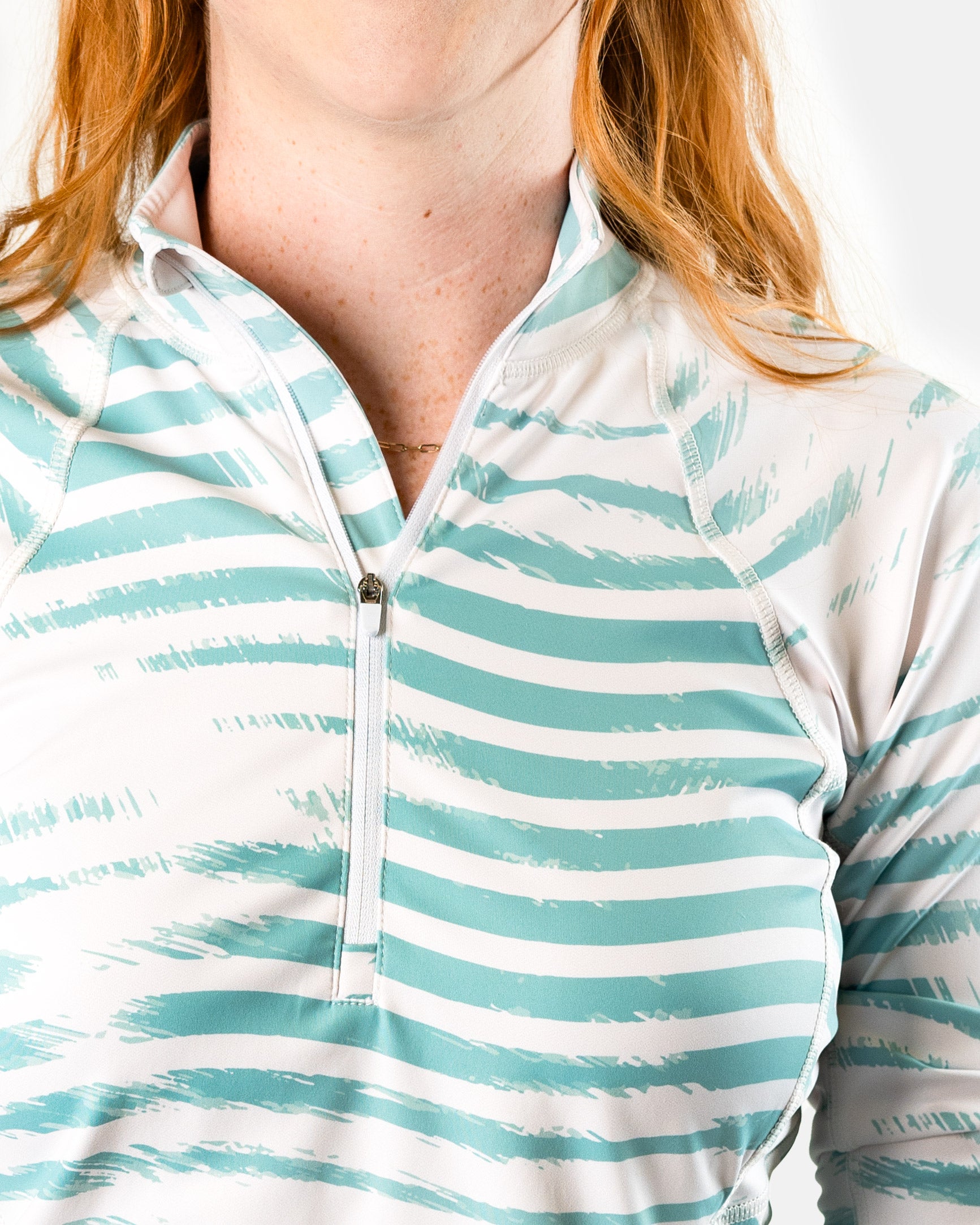 Switchback women's golf cropped Q-zip jacket | Sunday Swagger