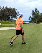 Crush orange golf polo | Sunday Swagger mens golf polo