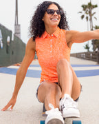 Crush orange women's golf polo | Sunday Swagger