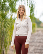 Latte cream women's cropped golf Qzip | Sunday Swagger